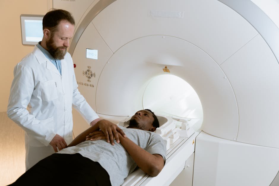 Medical professional preparing patient for MRI scan in modern clinic.